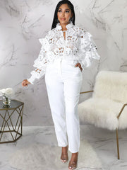 Tops florales calados con mangas de linterna