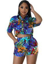 Conjunto de dos piezas de camisa y pantalones cortos de manga corta con estampado