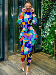 Figurbetonter Jumpsuit mit geometrischem Muster und langen Ärmeln