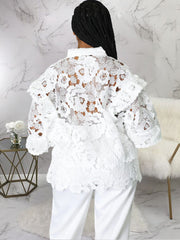 Tops florales calados con mangas de linterna