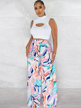 Tops cortos de dos piezas con estampado floral y pantalones largos