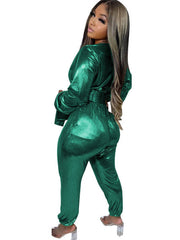 Glitzernder, langärmliger, figurbetonter Jumpsuit mit V-Ausschnitt