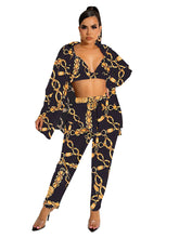 Conjunto de tres piezas con abrigo estampado, sujetador y pantalones largos