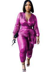 Glitzernder, langärmliger, figurbetonter Jumpsuit mit V-Ausschnitt