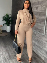 Conjunto de dos piezas: top asimétrico y pantalón largo