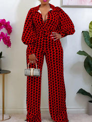 Langärmliger Jumpsuit mit Hahnentrittmuster und weitem Bein