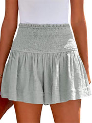 Elastische kurze Hose mit hoher Taille und Rüschen