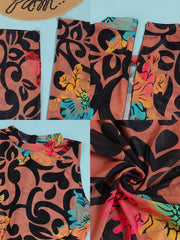 Ärmelloser, figurbetonter Jumpsuit aus Netzstoff mit Blumendruck