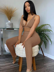 Crop-Top mit tiefem V-Ausschnitt und lange figurbetonte Hose