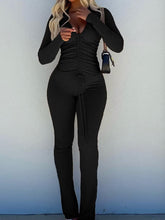 Conjunto de top corto de manga larga con cordón y pantalones largos acampanados