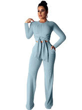 Conjunto de dos piezas de top y pantalón largo con lazo