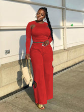 Conjunto de dos piezas de top corto con aberturas y pantalones de cintura alta