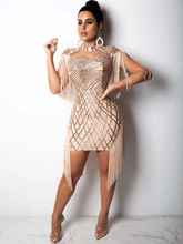 Minivestido con borlas y purpurina de retazos de malla