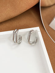 Minimalistische doppellagige geometrische Ohrringe