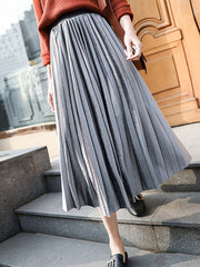 Faldas midi de terciopelo plisadas de cintura alta