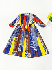 Vestidos midi con estampado de figuras y mangas largas