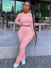 Conjunto de dos piezas de top corto de manga larga y pantalones apilados