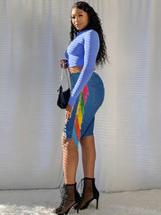 Stretchige, mehrfarbige Distressed-Jeans-Shorts mit seitlichen Quasten