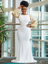 Einfarbiges, glitzerndes Maxikleid mit langen Puffärmeln und Fischschwanz