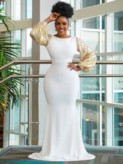 Einfarbiges, glitzerndes Maxikleid mit langen Puffärmeln und Fischschwanz