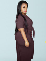 Conjunto de dos piezas de top con nudo torcido y falda con bolsillo, talla grande