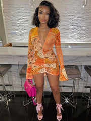 Bedrucktes, langärmliges Minikleid mit V-Ausschnitt und Kordelzug