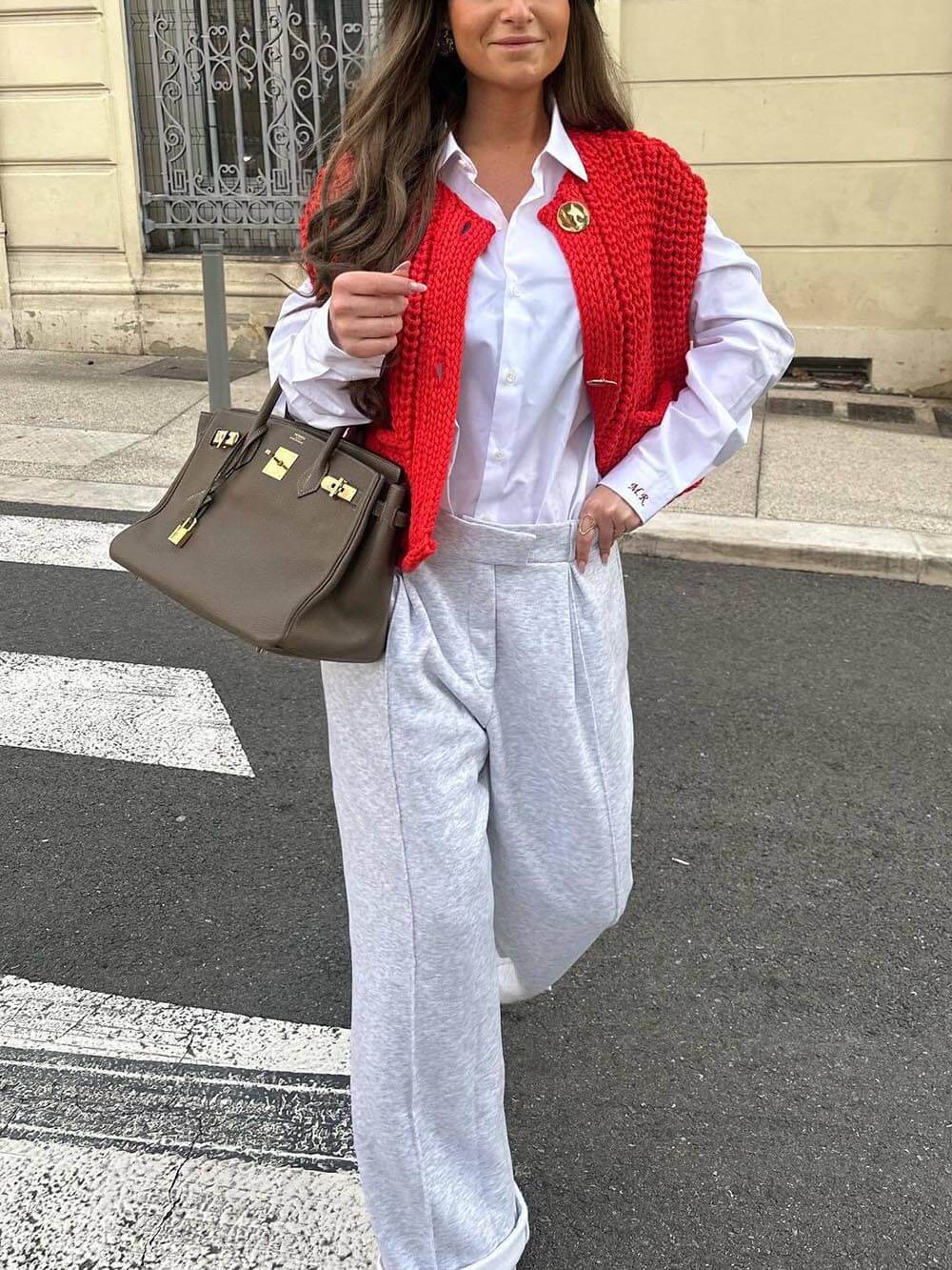 Elegante cárdigan de punto corto sin mangas con bolsillo