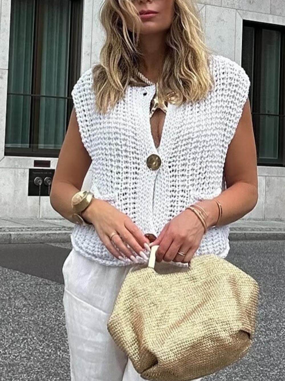 Elegante cárdigan de punto corto sin mangas con bolsillo