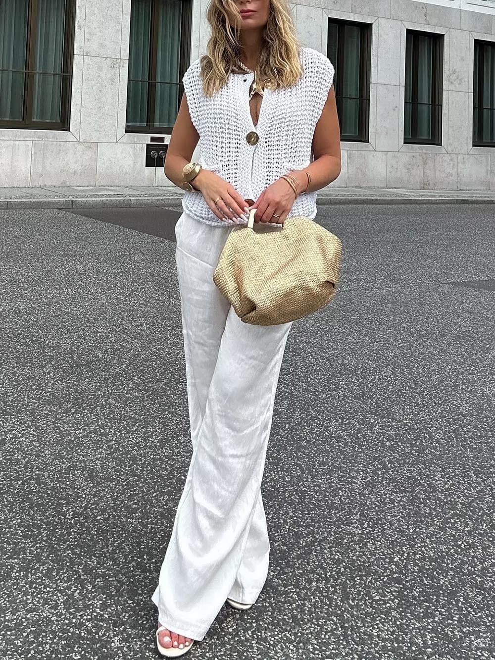 Elegante cárdigan de punto corto sin mangas con bolsillo