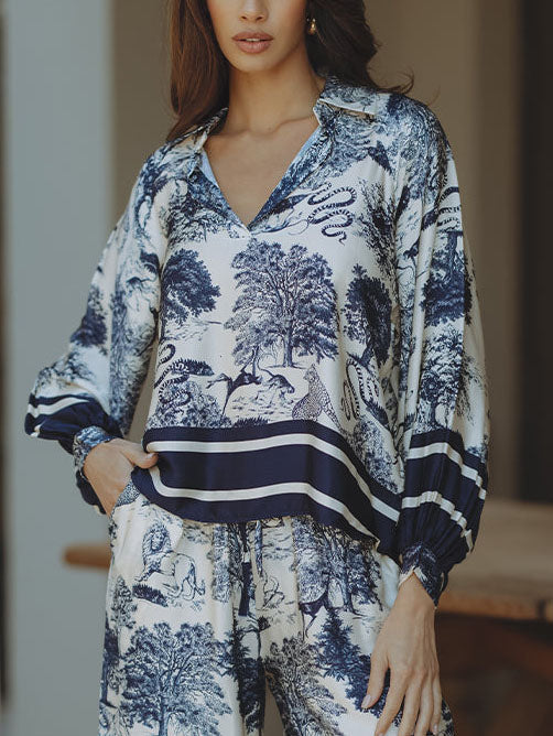 Top holgado de manga larga con estampado floral de jungla de satén