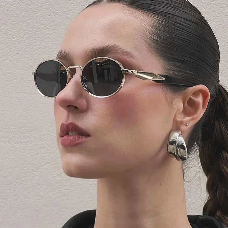 Gold-Framed Round Sunglasses with Dark Lenses