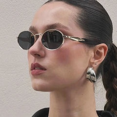 Gold-Framed Round Sunglasses with Dark Lenses