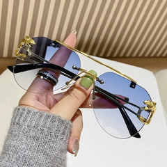 Rimless Rectangle Sunglasses with Gold Lion Head Temples