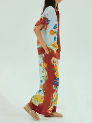 Camisa holgada con botones y estampado floral soleado