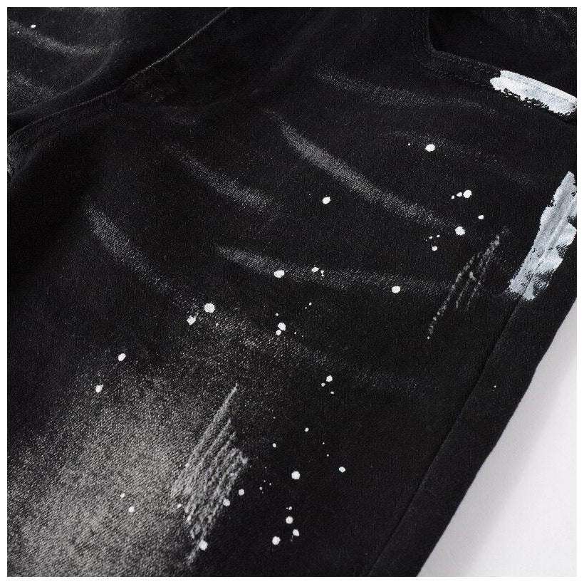 White paint splatters men's jeans