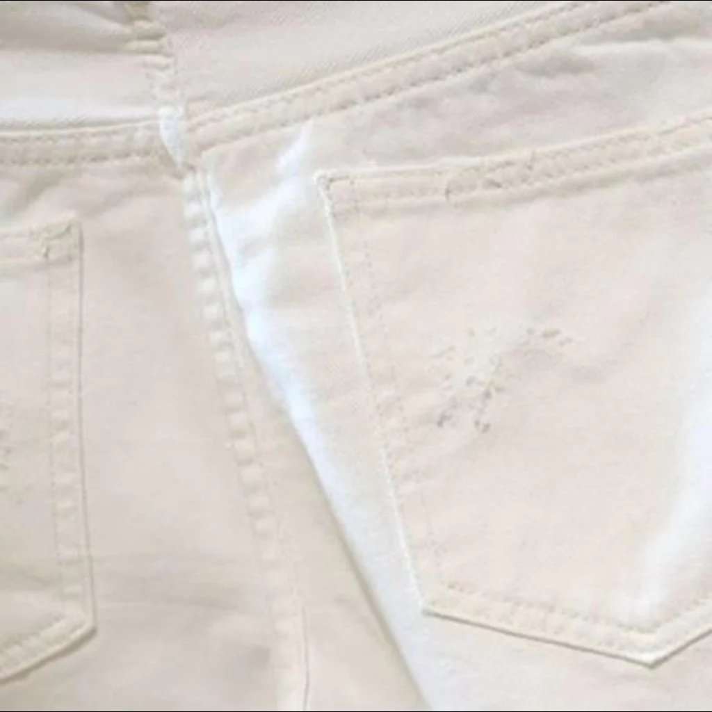 White men's distressed denim shorts